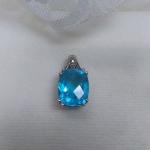 10k white gold Blue Topaz pendant signed EMA